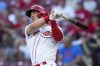 FILE - Cincinnati Reds' Kyle Farmer bats during the team's baseball game against the St. Louis Cardinals on Aug. 31, 2022, in Cincinnati. The Minnesota Twins have acquired Farmer from the Reds in a trade for minor-league right-hander Casey Legumina. (AP Photo/Jeff Dean, File)