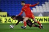 FILE - Wales' Ben Cabango (5) and Mexico's Hirving Lozano fight for the ball during a friendly soccer match at the Cardiff City Stadium, in Cardiff, Wales, Saturday, March 27, 2021. Cabango is preparing for Wales’ first World Cup game in 64 years, against the United States on Monday, Nov. 21, 2022. (AP Photo/Ian Walton, File)