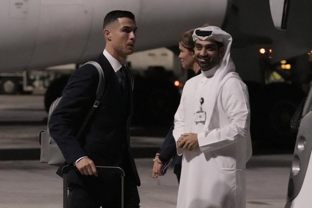 Cristiano Ronaldo of Portugal's national soccer team arrives at Hamad International airport in Doha, Qatar, Friday, Nov. 18, 2022 ahead of the upcoming World Cup. Portugal will play the first match in the World Cup against Ghana on Nov. 23. (AP Photo/Hassan Ammar)