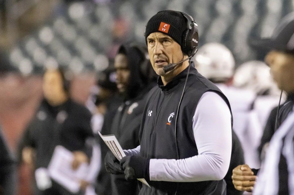 Cincinnati head coach Luke Fickell looks on in the first half of an NCAA college football game against Temple, Saturday, Nov. 19, 2022, in Philadelphia. (AP Photo/Laurence Kesterson)