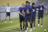 United States midfielder Weston McKennie, center, and other players participate in an official training session at Al-Gharafa SC Stadium, in Doha, Saturday, Nov. 19, 2022. (AP Photo/Ashley Landis)