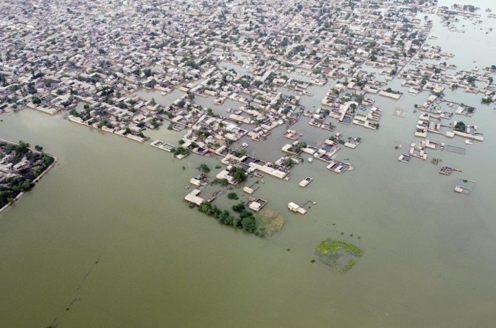 FILE -Homes are surrounded by floodwaters in Jaffarabad, a district of Pakistan's southwestern Baluchistan province, Sept. 1, 2022. (AP Photo/Zahid Hussain, File)