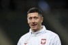 CORRECTS NAME OF THE STADIUM - Robert Lewandowski looks on prior to an international friendly soccer match between Poland and Chile at the Polish Army Stadium stadium in Warsaw, Poland Wednesday, Nov. 16, 2022. (AP Photo/Rafal Oleksiewicz)