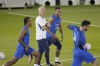 From left, France's Jules Kounde, France's national team coach Didier Deschamps, Kylian Mbappe and Hugo Lloris during a training session at the Jassim Bin Hamad stadium in Doha, Qatar, Sunday, Nov. 20, 2022. France will play their first match in the World Cup against Australia on Nov. 22. (AP Photo/Christophe Ena)