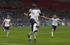 England's Bukayo Saka celebrates after scoring his side's second goal during the World Cup group B soccer match between England and Iran at the Khalifa International Stadium in Doha, Qatar, Monday, Nov. 21, 2022. (AP Photo/Alessandra Tarantino)