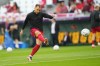 Denmark's Christian Eriksen warms up before the World Cup group D soccer match between Denmark and Tunisia, at the Education City Stadium in Al Rayyan , Qatar, Tuesday, Nov. 22, 2022. (AP Photo/Petr David Josek)