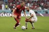 Denmark's Christian Eriksen controls the ball during the World Cup group D soccer match between Denmark and Tunisia, at the Education City Stadium in Al Rayyan , Qatar, Tuesday, Nov. 22, 2022. (AP Photo/Hassan Ammar)