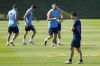Argentina's head coach Lionel Scaloni walks on the field during a training session of Argentina's national soccer team in Doha, Wednesday, Nov. 23, 2022. (AP Photo/Jorge Saenz)