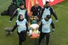 Paramedics carry Saudi Arabia's Yasser Al-Shahrani on a stretcher during the World Cup group C soccer match between Argentina and Saudi Arabia at the Lusail Stadium in Lusail, Qatar, Tuesday, Nov. 22, 2022. (AP Photo/Luca Bruno)