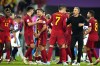 Spain's head coach Luis Enrique, second from right, celebrate with players at the end of the World Cup group E soccer match between Spain and Costa Rica, at the Al Thumama Stadium in Doha, Qatar, Wednesday, Nov. 23, 2022. (AP Photo/Julio Cortez)