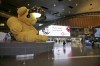 FILE - A giant teddy bear adorns the Hamad International Airport in Doha, Qatar, May 6, 2018. Just as soccer fans going to a game in a European city might take a metro, tens of thousands of foreigners attending the World Cup in Qatar this month are commuting to matches by air. (AP Photo/Kamran Jebreili, File)