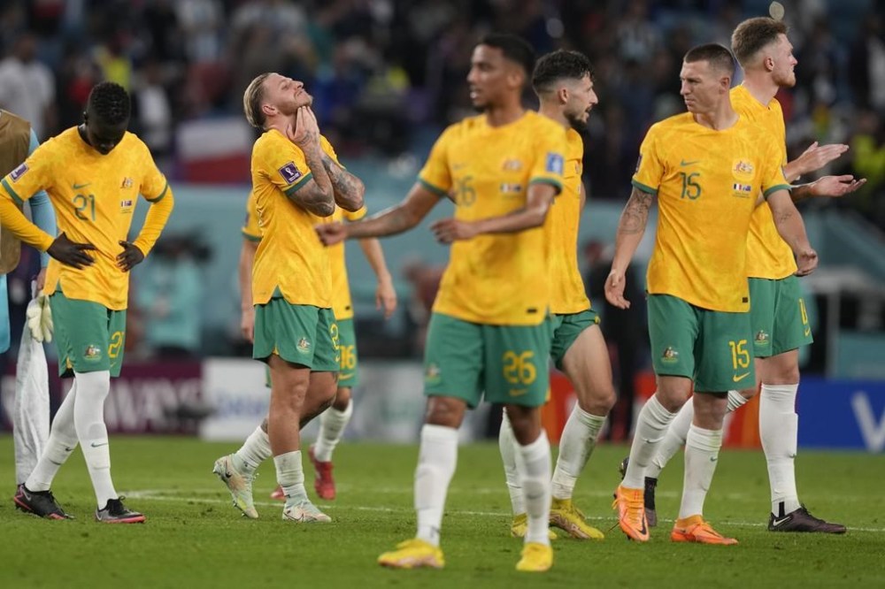 Australian players stand dejected after the World Cup group D soccer match between France and Australia, at the Al Janoub Stadium in Al Wakrah, Qatar, Friday, Nov. 4, 2022. (AP Photo/Frank Augstein)