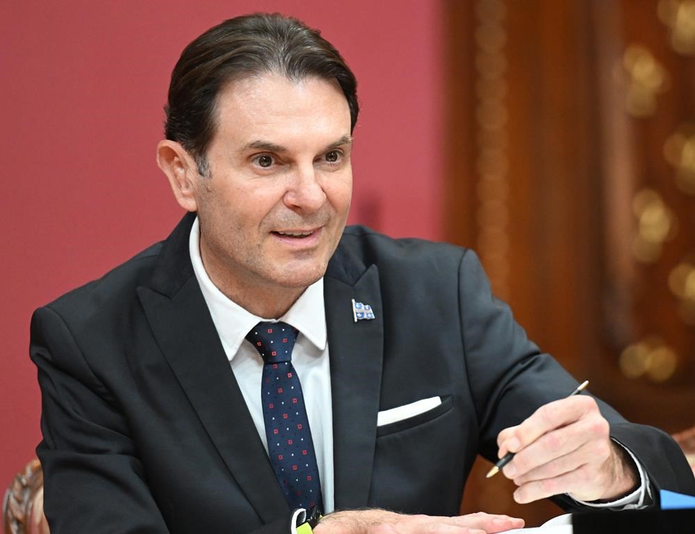 Quebec Public Security Minister Francois Bonnardel is sworn in during a ceremony at the Quebec Legislature, in Quebec City, Thursday, Oct. 20, 2022. The Quebec government will appeal a recent ruling banning random police stops in the province. Bonnardel says the government is appealing because it's unacceptable to deprive police of an important tool. THE CANADIAN PRESS/Jacques Boissinot