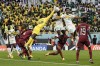 Qatar's goalkeeper Meshaal Barsham stops a shot during the World Cup group A soccer match between Qatar and Senegal, at the Al Thumama Stadium in Doha, Qatar, Friday, Nov. 25, 2022. (AP Photo/Hassan Ammar)