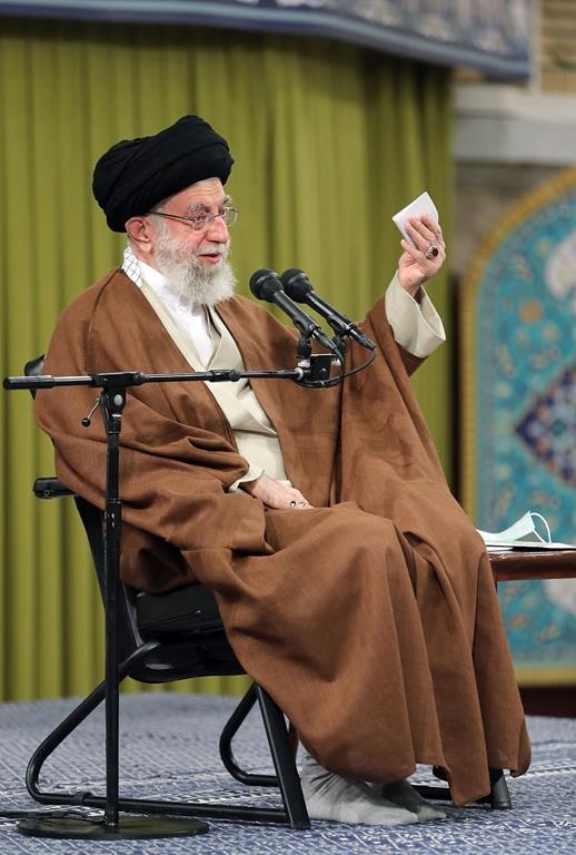 In this picture released by the official website of the office of the Iranian supreme leader, Supreme Leader Ayatollah Ali Khamenei speaks during a meeting with a group of Basij paramilitary force in Tehran, Iran, Saturday, Nov. 26, 2022. Iran's supreme leader praised paramilitary volunteers tasked with quashing dissent on Saturday in a televised address as dozens of eye doctors warned that a rising number of demonstrators have been blinded by security forces during anti-government protests. The Basij have taken a leading role in clamping down on demonstrations that began Sept. 17, ignited by the death of a young woman while in the custody of Iran's morality police. (Office of the Iranian Supreme Leader via AP)