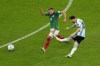 Argentina's Lionel Messi scores his side's first goal during the World Cup group C soccer match between Argentina and Mexico, at the Lusail Stadium in Lusail, Qatar, Saturday, Nov. 26, 2022. (AP Photo/Julio Cortez)