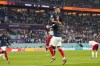 France's Kylian Mbappe celebrates with teammate Theo Hernandez after scoring his side's opening goal against Denmark during a World Cup group D soccer match at the Stadium 974 in Doha, Qatar, Saturday, Nov. 26, 2022. (AP Photo/Martin Meissner)