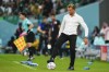 Saudi Arabia's head coach Herve Renard controls the ball at the sideline during the World Cup group C soccer match between Poland and Saudi Arabia, at the Education City Stadium in Al Rayyan , Qatar, Saturday, Nov. 26, 2022. (AP Photo/Manu Fernandez)