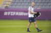 Head coach Gregg Berhalter of the United States walks on the pitch during an official training session at Al Gharafa SC Stadium, in Doha, Sunday, Nov. 27, 2022. (AP Photo/Ashley Landis)