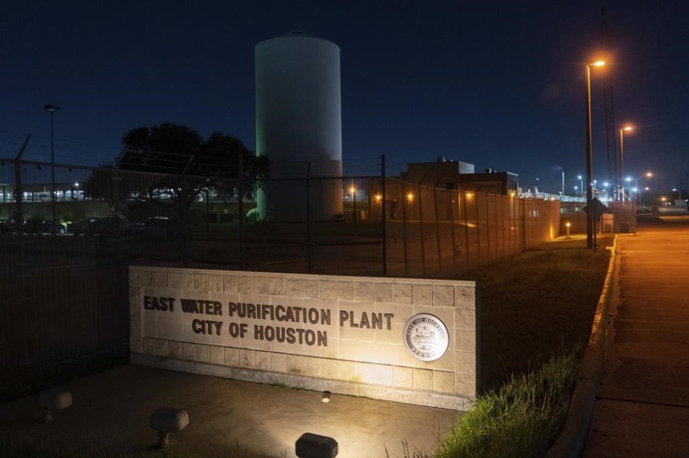 The East Water Purification Plant after a boil water notice was issued for the entire city of Houston on Monday, Nov. 28, 2022, in Houston. Officials say more than 2 million people in the Houston area remain under a boil order notice after a power outage caused low water pressure at a water purification plant. The order — which means water must be boiled before it’s used for cooking, bathing or drinking — also prompted schools in the Houston area to close Monday. (Mark Mulligan/Houston Chronicle via AP)