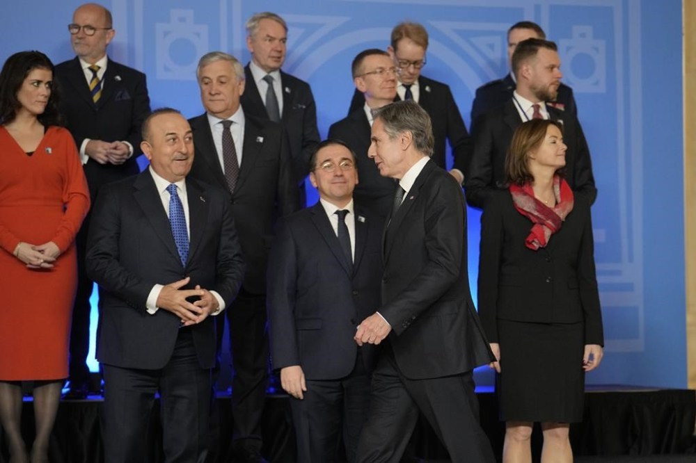 United States Secretary of State Antony Blinken arrives for a family photo during the first day of the meeting of NATO Ministers of Foreign Affairs in Bucharest, Romania, Tuesday, Nov. 29, 2022. (AP Photo/Vadim Ghirda)