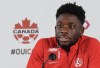 Canada forward Alphonso Davies speaks to the media after practice at the World Cup in Doha, Qatar on Tuesday, November 29, 2022. THE CANADIAN PRESS/Nathan Denette