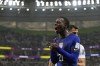 United States' Tim Weah (21) reacts after losing the ball out of bounds during the World Cup group B soccer match between Iran and the United States at the Al Thumama Stadium in Doha, Qatar, Tuesday, Nov. 29, 2022. (AP Photo/Ashley Landis)