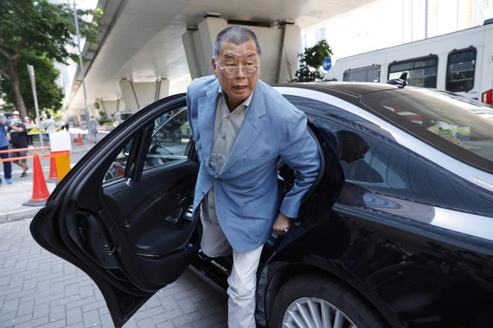 FILE - Hong Kong media tycoon Jimmy Lai, founder of the local newspaper Apple Daily, arrives a court in Hong Kong, Tuesday, May 5, 2020. Lai broke into the media industry about 30 years ago armed with the belief that delivering information equates with delivering freedom. Lai now is accused of endangering national security with his now-defunct pro-democracy newspaper Apple Daily. (AP Photo/Kin Cheung, File)