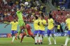 Brazil's goalkeeper Alisson, top, clears the ball during the World Cup group G soccer match between Brazil and Switzerland at the Stadium 974 in Doha, Qatar, Monday, Nov. 28, 2022. (AP Photo/Hassan Ammar)