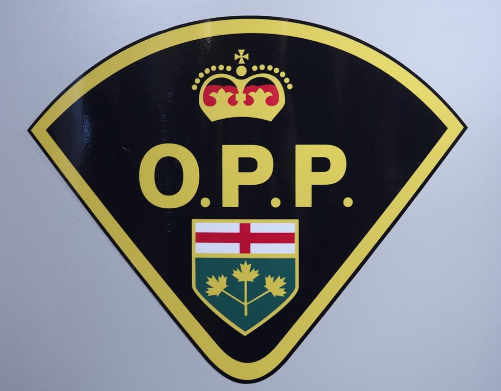 An Ontario Provincial Police logo is shown during a press conference in Barrie, Ont., on Wednesday, April 3, 2019. THE CANADIAN PRESS/Nathan Denette