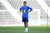 England's Ben White stands on the field during England's official training at at Al Wakrah Sports Complex, in Al Wakrah, Qatar, Saturday, Nov. 26, 2022. (AP Photo/Abbie Parr)