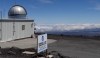 FILE - This 2019 photo provided by NOAA shows the Mauna Loa Atmospheric Baseline Observatory, high atop Hawaii's largest mountain in order to sample well-mixed background air free of local pollution. Mauna Loa’s volcano eruption has temporarily knocked off power to the world’s premier station that measures heat-trapping carbon dioxide in the atmosphere, but officials said that there are hundreds of other carbon dioxide monitoring sites across the globe. (Susan Cobb/NOAA Global Monitoring Laboratory via AP, File)
