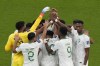 Team Saud Arabia comes together before the World Cup group C soccer match between Saudi Arabia and Mexico, at the Lusail Stadium in Lusail, Qatar, Wednesday, Nov. 30, 2022. (AP Photo/Luca Bruno)