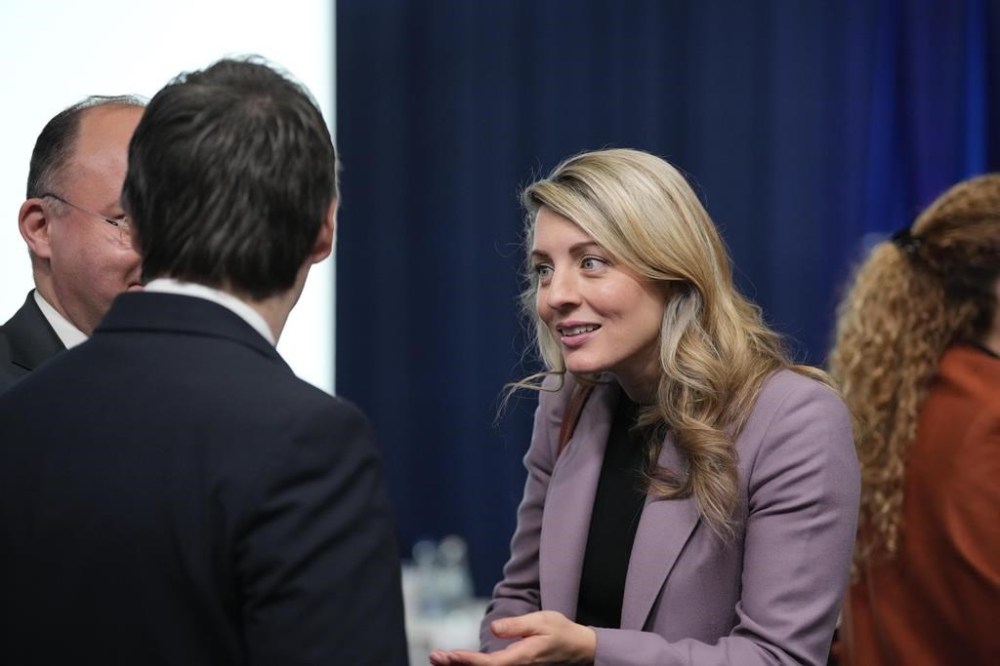 Canada's Foreign Minister Melanie Joly attends the meeting of NATO Ministers of Foreign Affairs in Bucharest, Romania, Wednesday, Nov. 30, 2022. Joly is announcing another $1 million for the International Criminal Court. THE CANADIAN PRESS/AP-Andreea Alexandru