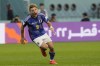 Japan's Ritsu Doan celebrates scoring his side's first goal during a World Cup group E soccer match at the Khalifa International Stadium in Doha, Qatar, Thursday, Dec. 1, 2022. (AP Photo/Eugene Hoshiko)