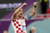 Croatia's Luka Modric gestures towards the supporters at the end of the World Cup group F soccer match between Croatia and Belgium at the Ahmad Bin Ali Stadium in Al Rayyan, Qatar, Thursday, Dec. 1, 2022. (AP Photo/Luca Bruno)