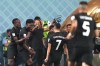 Canada forward Alphonso Davies, second from left, celebrates his goal against Croatia with teammates during first half group F World Cup soccer action at the Khalifa International Stadium in Al Rayyan, Qatar on Sunday, Nov. 27, 2022. THE CANADIAN PRESS/Nathan Denette
