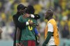 Cameroon's head coach Rigobert Song, left, and Cameroon's Andre-Frank Zambo Anguissa celebrate at the end of the World Cup group G soccer match between Cameroon and Brazil, at the Lusail Stadium in Lusail, Qatar, Friday, Dec. 2, 2022. (AP Photo/Natacha Pisarenko)
