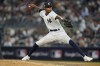 FILE - New York Yankees relief pitcher Miguel Castro delivers against the Houston Astros during the eighth inning of Game 3 of the baseball AL Championship series, Oct. 22, 2022, in New York. The Arizona Diamondbacks signed Castro to a one-year contract Friday, Dec. 2. Castro, who turns 28 this month, has already spent eight years in the big leagues, most recently with the Yankees. He was 5-0 with a 4.03 ERA in 34 appearances last season. (AP Photo/Seth Wenig, File)