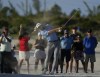 Cameron Young, of the United States, hits from the sands at the 16th hole during the third round of the Hero World Challenge PGA Tour at the Albany Golf Club, in New Providence, Bahamas, Saturday, Dec. 3, 2022. (AP Photo/Fernando Llano)