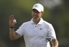 Rory McIlroy of Northern Ireland reacts after finishing on the 18th green during DP World Tour Championship in Dubai, United Arab Emirates, Sunday, Nov. 20, 2022. (AP Photo/Martin Dokoupil)
