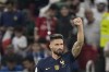 France's Olivier Giroud celebrates scoring his side's first goal during the World Cup round of 16 soccer match between France and Poland, at the Al Thumama Stadium in Doha, Qatar, Sunday, Dec. 4, 2022. (AP Photo/Martin Meissner)