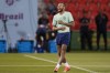 Brazil's Neymar smiles during a training session at the Grand Hamad stadium in Doha, Qatar, Sunday, Dec. 4, 2022. Brazil will face South Korea in a World Cup round of 16 soccer match on Dec. 5. (AP Photo/Andre Penner)