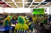 A fan wears a shirt in support of Pelé at a Brazilian fan party before the the World Cup round of 16 soccer match between Brazil and South Korea, in Doha, Dec. 5, 2022. The 82-year-old Pelé remained in a hospital in San Paulo recovering from a respiratory infection that was aggravated by COVID-19, but the news coming from Brazil early Monday was good. (AP Photo/Ashley Landis)