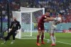 Serbia's Nikola Milenkovic, center, pushes Switzerland's Granit Xhaka during the World Cup group G soccer match between Serbia and Switzerland, in Doha, Qatar, Friday Dec. 2, 2022. (AP Photo/Ricardo Mazalan)