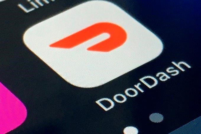 In this Feb. 27, 2020, file photo, the DoorDash app is shown on a smartphone in New York. THE CANADIAN PRESS/AP Photo, File)
