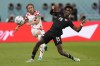 Croatia's Luka Modric, left, passes the ball past Canada's Ismael Kone during the World Cup group F soccer match between Croatia and Canada, at the Khalifa International Stadium in Doha, Qatar, Sunday, Nov. 27, 2022. Midfielder Kone is leaving CF Montreal for England's Watford, becoming the second member of Canada's World Cup squad to switch teams since leaving Qatar. THE CANADIAN PRESS/AP-Darko Vojinovic
