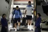 Paulo Dybala, right, of Argentina's national soccer team arrives with teammates at Hamad International airport in Doha, Qatar, Thursday, Nov. 17, 2022 ahead of the upcoming World Cup. Argentina will play the first match in the World Cup against Saudi Arabia on Nov. 22. (AP Photo/Hassan Ammar)
