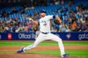 Toronto Blue Jays relief pitcher Jordan Romano (68) throws the ball during the ninth inning of AL baseball action against the Detroit Tigers, in Toronto on Thursday, July 28, 2022. Romano was named the winner of the Tip O’Neill Award on Tuesday as Canadian baseball player of the year. THE CANADIAN PRESS/Christopher Katsarov