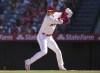 FILE - Los Angeles Angels' designated hitter Shohei Ohtani (17) waits for a pitch during the sixth inning of a baseball game against the Texas Rangers in Anaheim, Calif., Oct. 2, 2022. Ohtani has been voted the majors' best designated hitter for the second consecutive season. On Monday, Nov. 28, 2022, the Angels' two-way slugger won the Edgar Martinez Outstanding Designated Hitter Award, beating out Houston's Yordan Álvarez as the top player at the position in 2022. (AP Photo/Ashley Landis, File)
